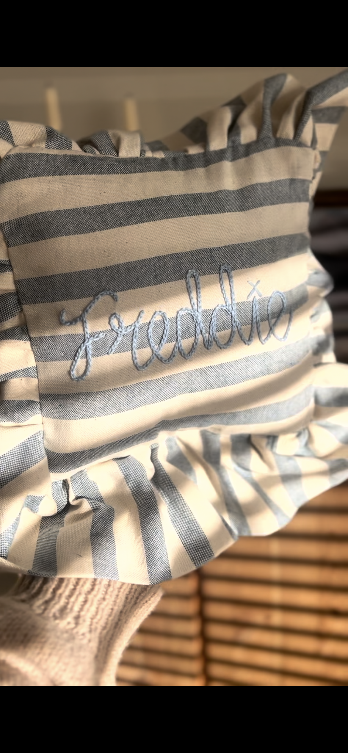 Handmade frilled cushion with name embroidery