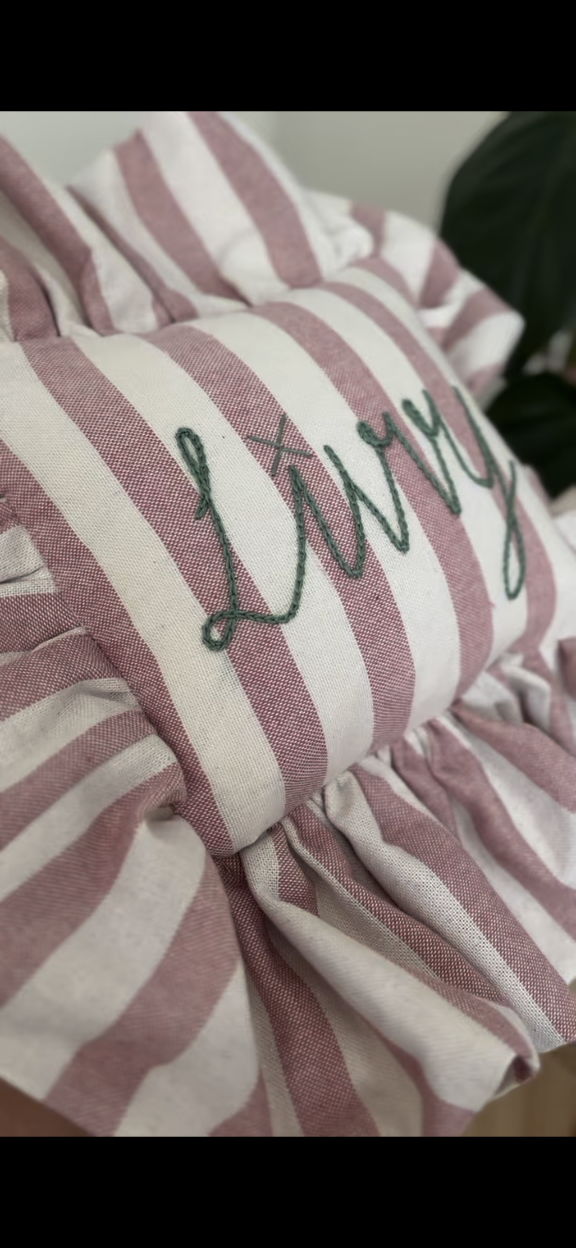 Handmade frilled cushion with name embroidery